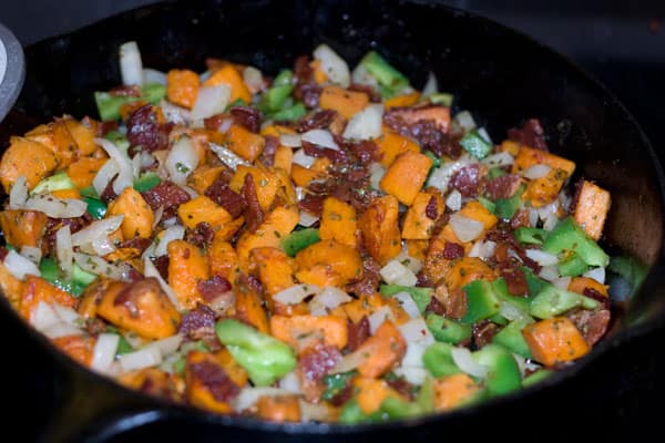 sweet potatoes and vegetables in pan
