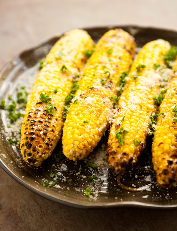 grilled corn on brown plate