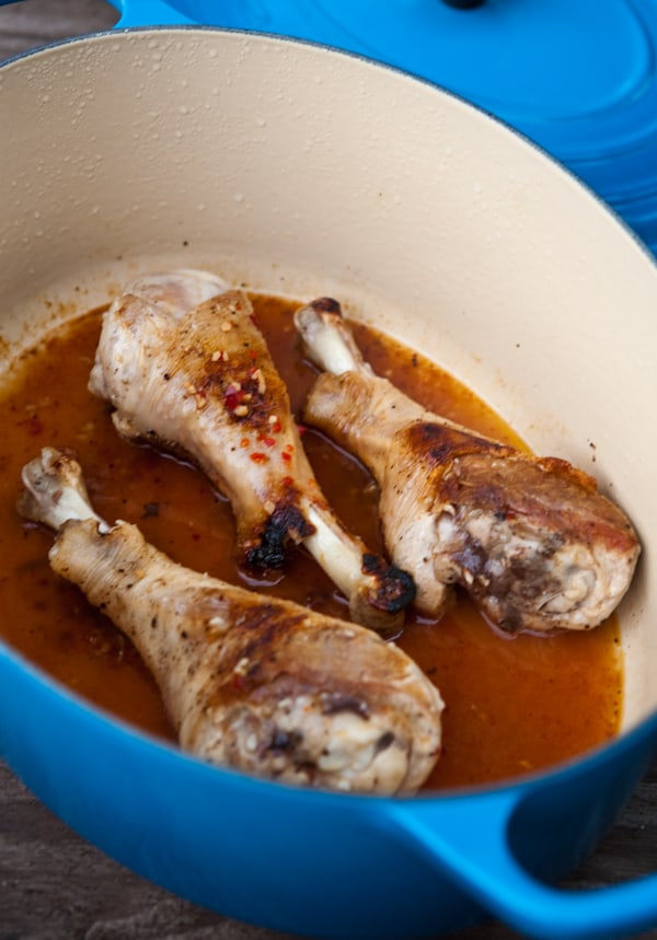 chicken legs in blue pot