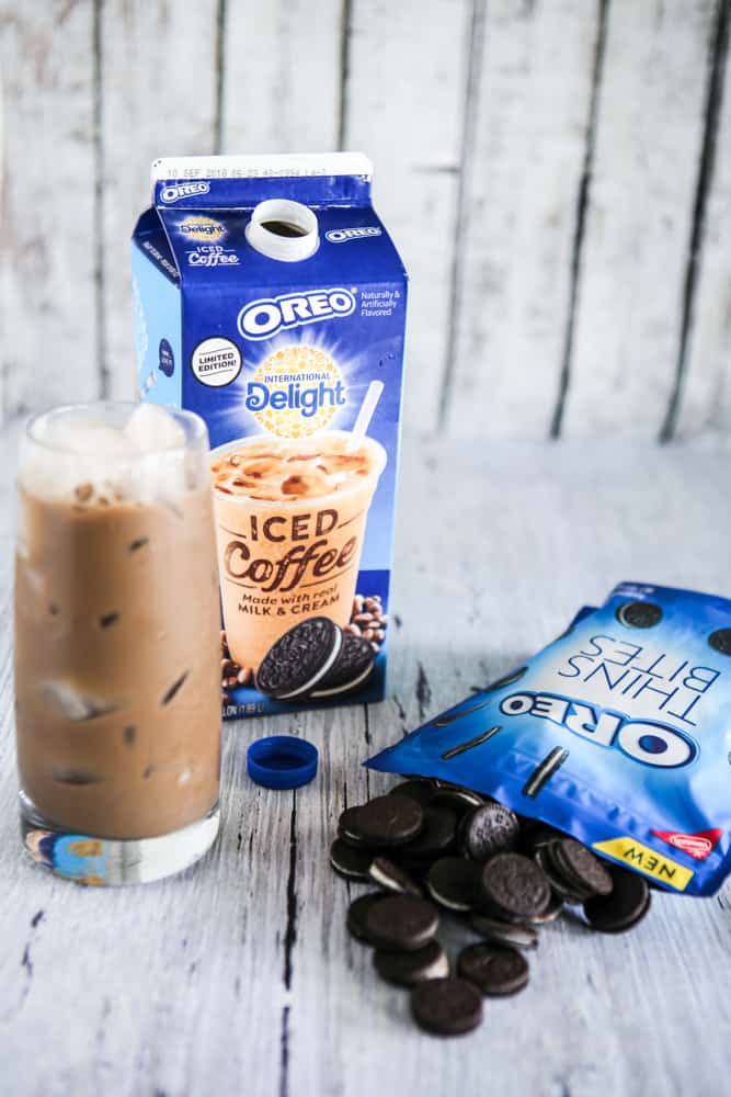 spilled oreo thin bites and oreo iced coffee in glass