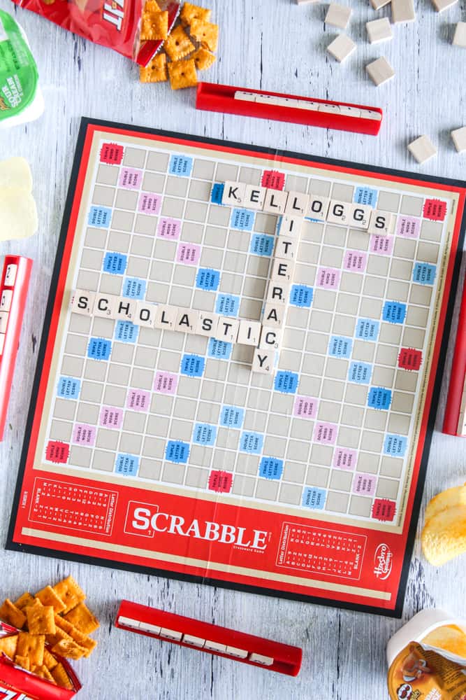scrabble board with kellogg’s, literacy, and scholastic