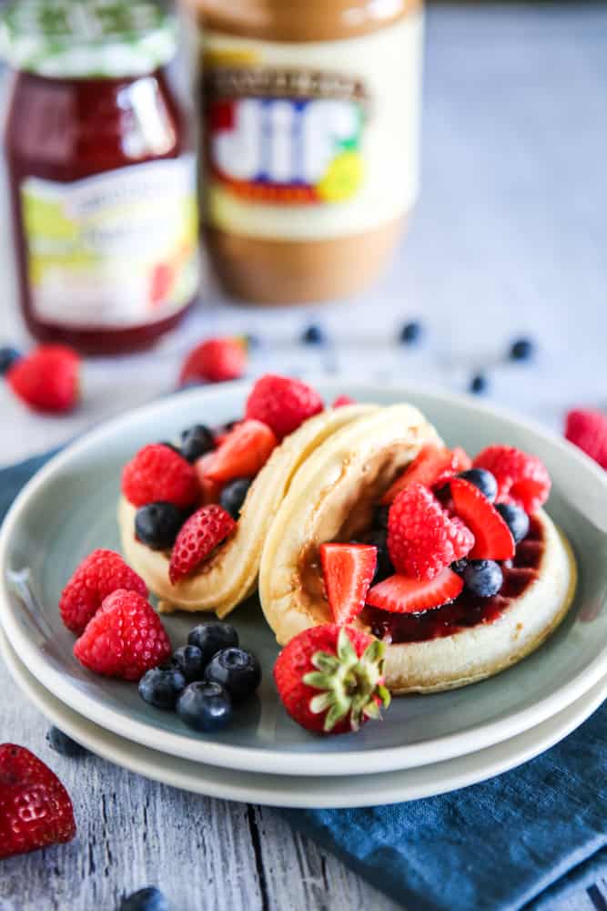fruit waffle tacos with jelly and peanut butter in background