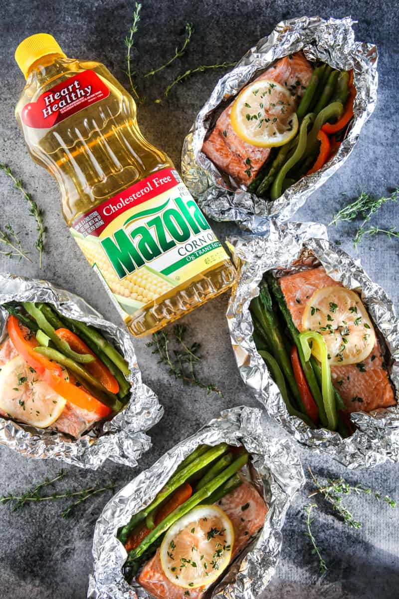 cooked salmon in tinfoil bowls