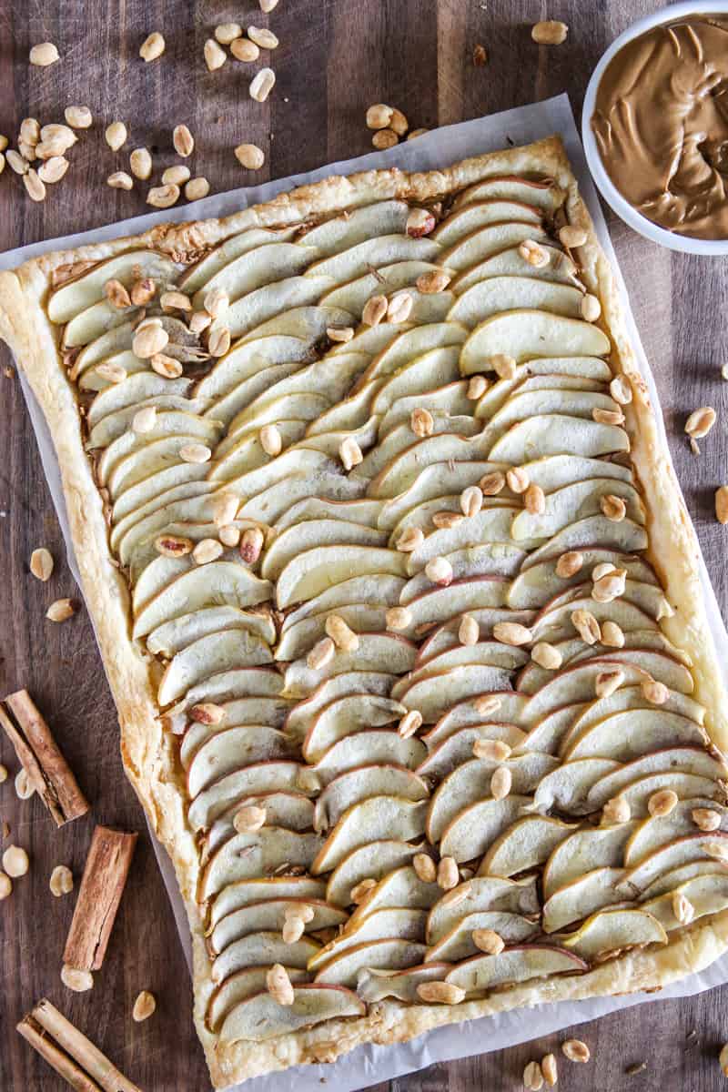 apple and peanut butter tart wood background