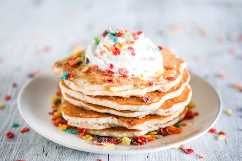 gluten free fruity pebble pancakes with whipped cream